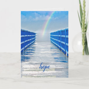 Carte espoir arc-en-ciel sur la jetée humide