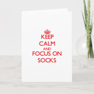 Carte Gardez le calme et le foyer sur des chaussettes
