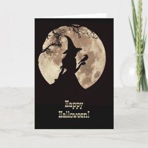 Carte Halloween avec une jolie sorcière et silhouette de