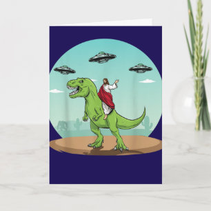 Carte Jésus drôle à cheval sur un dinosaure extraterrest
