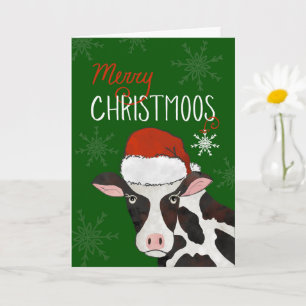 Carte Joyeuse vache de Noël avec chapeau de Père Noël