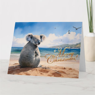 Carte Koala sur une plage de sable Joyeux Noël