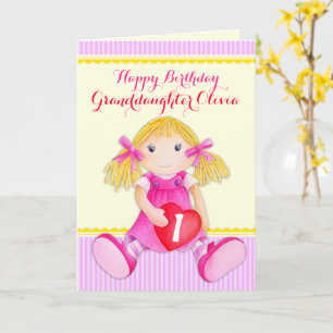 Carte La poupée de la petite-fille le premier anniversai