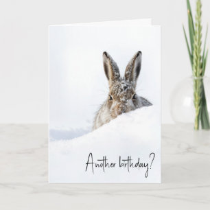 Carte Lapin d'anniversaire regardant par-dessus une cong