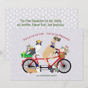Carte Les chiens montant une bicyclette présente Noël de