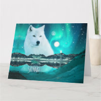 Loup arctique et nuit magique avec aurores boréale