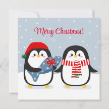 Mignons manchots avec un cadeau