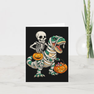 Carte Momie à cheval sur un squelette Dinosaure T Rex En