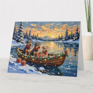 Carte Noël en bateau avec Airedale Terrier