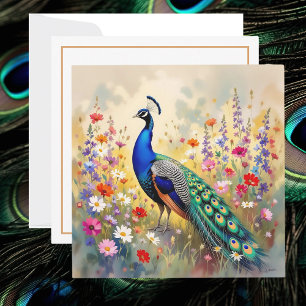 Carte Paon joli dans une prairie fleurie