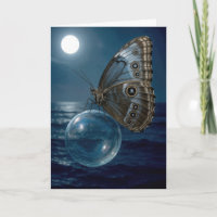 Papillon d'anniversaire flottant sur une bulle