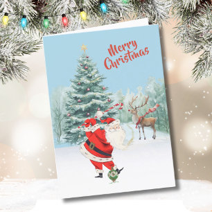 Carte Père Noël joue au golf son renne attend