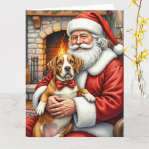 Carte Père Noël tenant un American Staffordshire Terrier