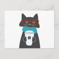 Chat aux lunettes tenant une tasse de café