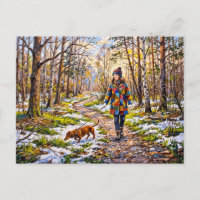 Dachshund marchant le long d'un chemin forestier e