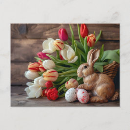 Carte Postale Easter bunny seated beside colorful eggs and tulip