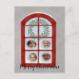 Carte Postale Famille derrière la fenêtre de Noël photo