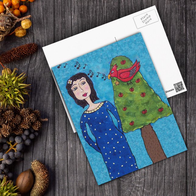 Carte Postale Folk Art Lady Apple Tree Red Bird Notes musicales (Folk art lady apple tree singing red bird with star necklace, music notes on blue postcard)
