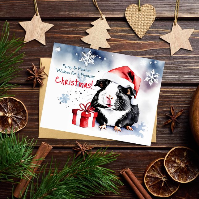 Carte Postale Joyeux Noël salutations guinée cobaye animal (Guinea pig Christmas greeting postcard cute watercolor Guinea pig wearing Santa hat with a gift)