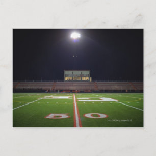 Carte Postale Le terrain de football américain éclairé la nuit