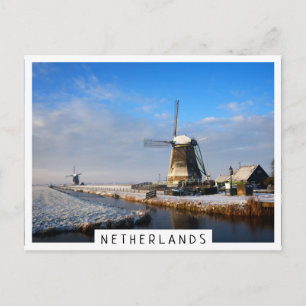 Carte Postale Moulin à vent dans la neige dans un paysage hivern