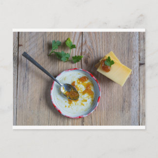 Carte Postale Onion pineapple chutney on rustic wood