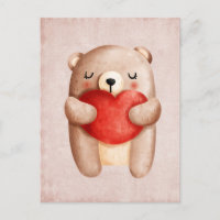 Ours en peluche mignon portant un coeur rouge