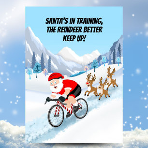 Carte Postale Père Noël à vélo avec des rennes
