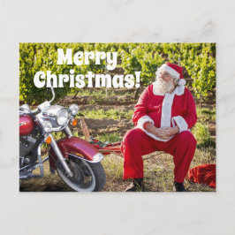 Carte Postale Père Noël se reposant avec sa moto Noël