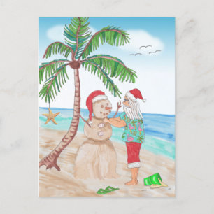 Carte Postale père Noël sur la plage Construire un Snowman de sa