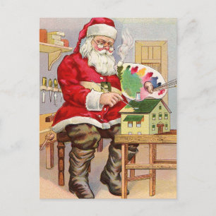 Carte Postale Santa peint une nouvelle maison de jouets