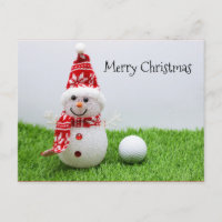 Snowman avec balle de golf sur herbe verte Noël