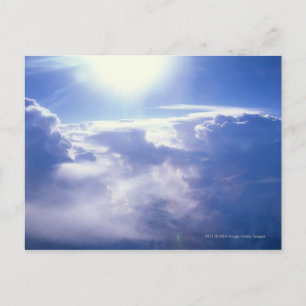Carte Postale Soleil brillant à travers les nuages
