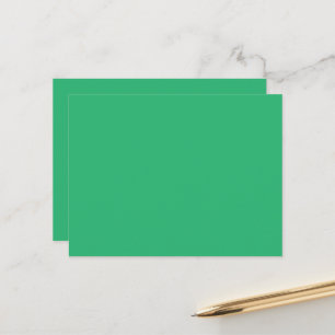 Carte Postale un arrière - plan vert avec une bordure blanche