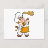 Vache comme cuisinier avec de la pâte