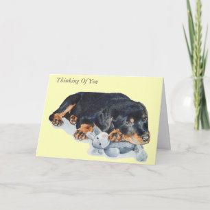 Carte rottweiler mignon de chiot avec l'ours de nounours