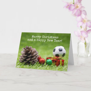 Carte Soccer Noël Vacances avec cône de pin et cadeaux 