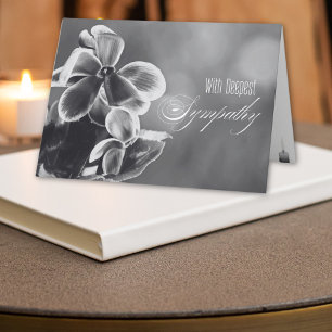 Carte Sympathie des fleurs de cyclamen et des bougies