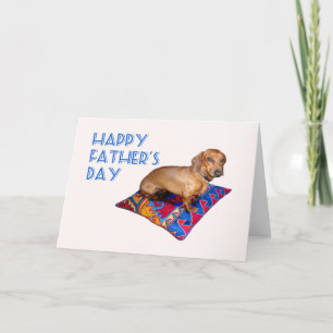 Carte Teckel sur le coussin, fête des pères heureuse