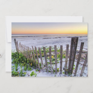 Carte Une clôture de plage au coucher du soleil
