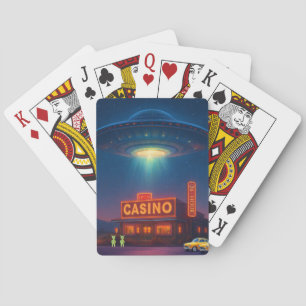 Cartes à jouer avec un OVNI au-dessus d'un casino