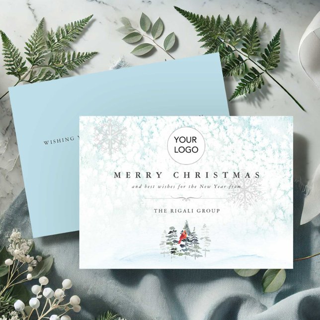 Cartes de Noël d'affaires avec logo (Business Christmas cards with logo blue winter scene with pine trees and a red cardinal.)