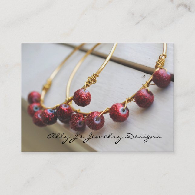 Cartes de visite rouges de boucles d'oreille de (Devant)