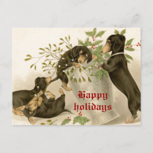 Cartes Pour Fêtes Annuelles Chiens jouant avec le mistletoe de Noël et la baie