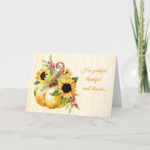 Citrouille d'automne avec des tournesols et des ba