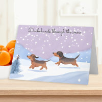 Dachshunds à travers la neige saucisse chien Noël