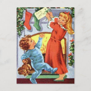 Cartes Pour Fêtes Annuelles Enfants heureux en pyjama à Noël Stockings