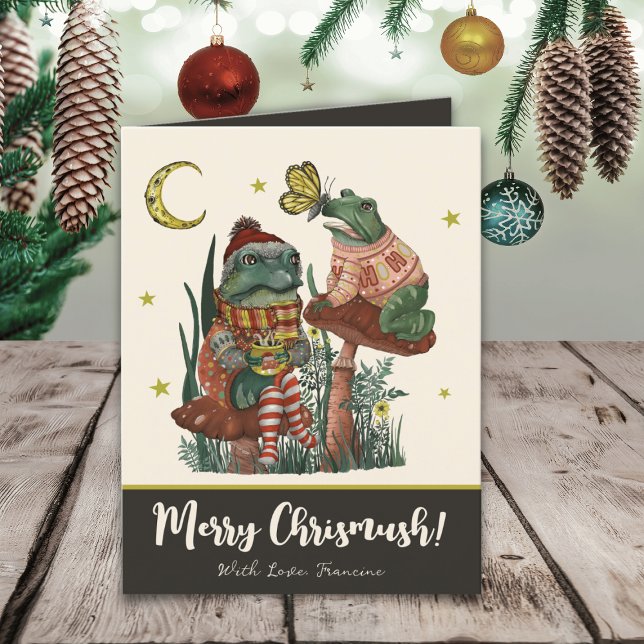 Cartes Pour Fêtes Annuelles Grenouille et crapaud noir Joyeux Noël (Cute black Merry Christmas card with an illustration of frogs sitting on mushrooms drinking cocoa)