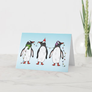 Cartes Pour Fêtes Annuelles Illustration de trois pingouins de Noël festifs