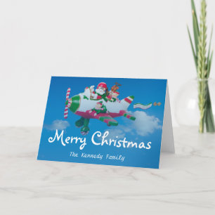 Cartes Pour Fêtes Annuelles Le Père Noël avec des elfes dans l'avion